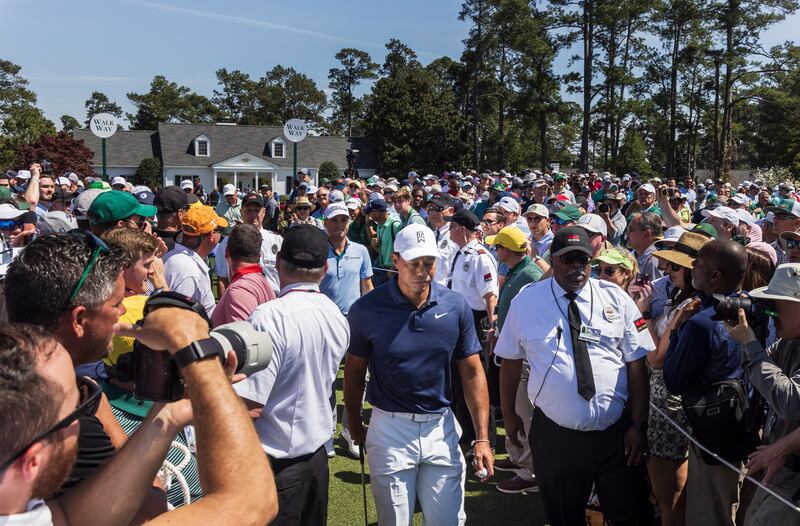 Tiger Woods walks to the first tee during a practice round at The Masters. EPA