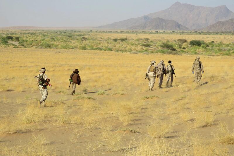 Fighters loyal to Yemen's government on the front line facing Iran-backed Houthi rebels in the country's north-eastern province of Marib on September 27.  All photos: AFP