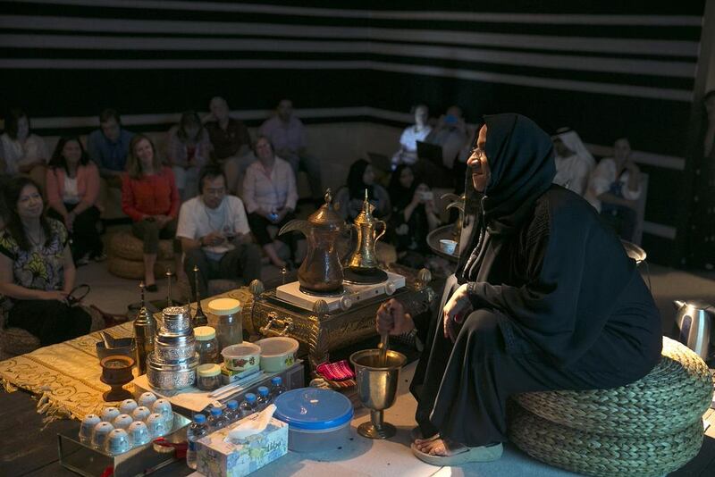 Historian Gaya Al Dhaheri talks about the tradition and story of gahwa, fragrant Arabic coffee, during a workshop, organized by the Abu Dhabi Tourism and Culture Authority, at the Qasr al Hosn exhibition building in downtown Abu Dhabi. Silvia Razgova / The National
