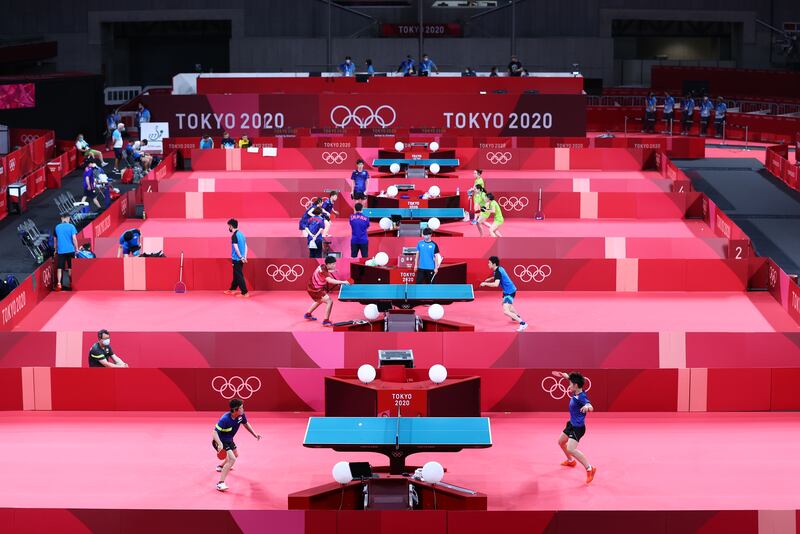 Britain, Singapore and Japan teams training ahead of the Tokyo Olympics table tennis competition on  at the Tokyo Metropolitan Gymnasium on Monday, July 19.