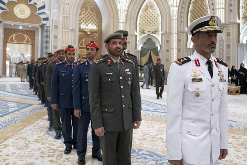 ABU DHABI, UNITED ARAB EMIRATES - May 20, 2018: HH Sheikh Saeed bin Hamdan bin Mohamed Al Nahyan,
(R) and members of the UAE Armed Forces, attend an iftar reception at the Presidential Palace. 

( Mohamed Al Hammadi / Crown Prince Court - Abu Dhabi )
---