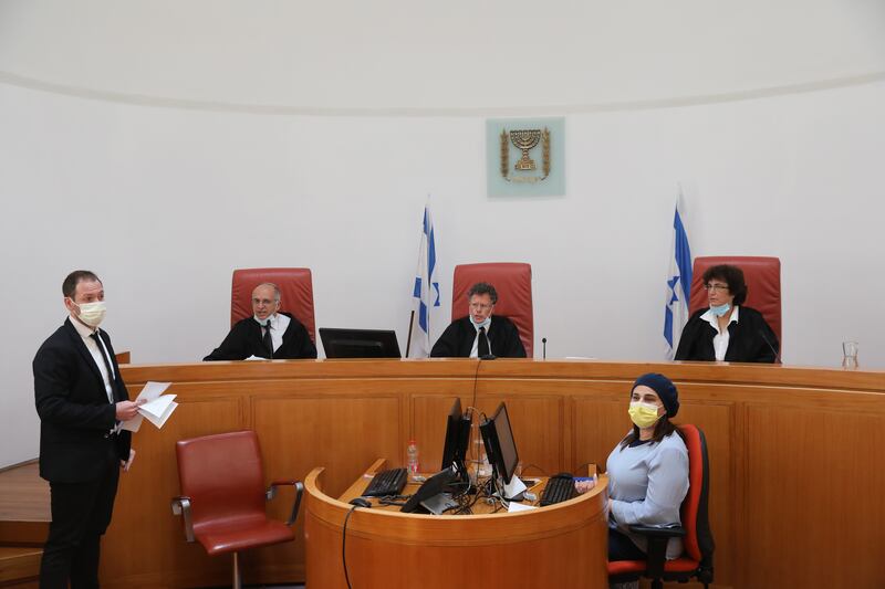 Judges at the Israeli Supreme Court in East Jerusalem discuss the eviction of Palestinian families from their homes in the city’s Sheikh Jarrah district.