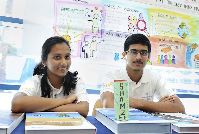 Students Ameesha Gupta, 16, and Anirudh Kulkarni, 17, with their Shamzee soda invention at Zayed University in Dubai on March 24, 2014. Sarah Dea/The National