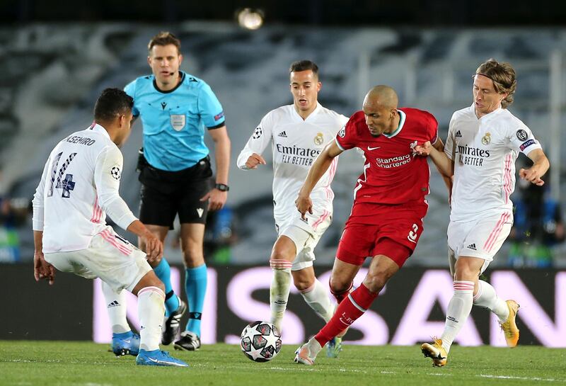 Fabinho - 4: The Brazilian never got to the pace of the Real midfield. He was unusually static and easily bypassed by the home side's crisp passing. PA