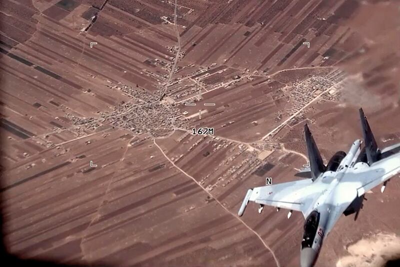 A Russian Su-35 flies near a US Air Force MQ-9 Reaper drone on July 5 over Syria. AP