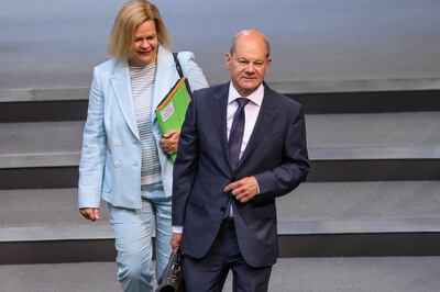 German Chancellor Olaf Scholz, right, and Interior Minister Nancy Faeser condemned the slogans sung at an island party. EPA 