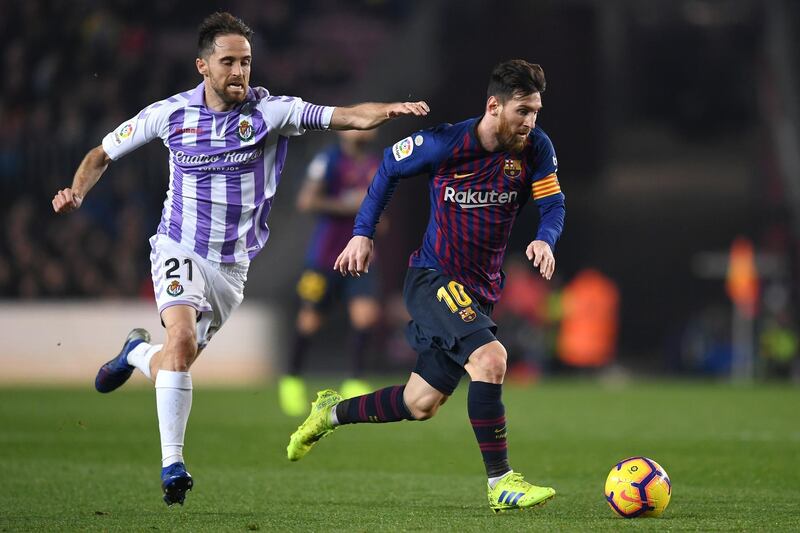 Barcelona's Lionel Messi runs with the ball. Getty Images