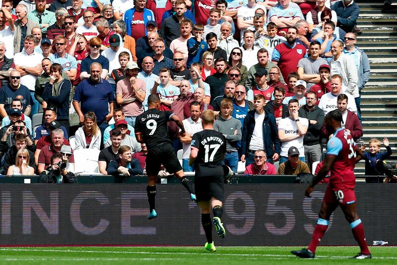 Jesus celebrates scoring City's first league goal of the season. AFP