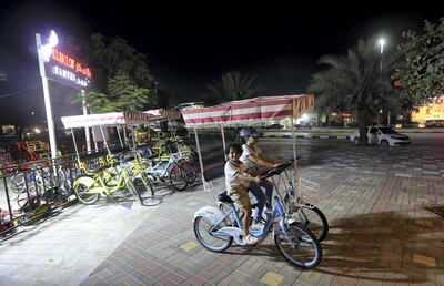 Ras Al Khaimah, May, 09, 2019:  Kids ride the rental cycles at the Al Qasimi Corniche in Ras Al Khaimah . Satish Kumar/ For the National / Story by Rubai Haza