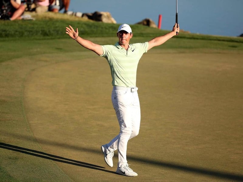 Rory McIlroy celebrates after sinking a birdie putt on the 18th green to win the Arnold Palmer Invitational. Stephen M Dowell / Orlando Sentinel via AP