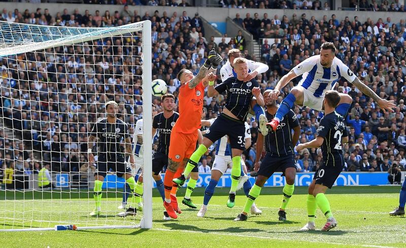 Brighton's Glenn Murray heads in a corner to give his side the lead against Manchester City. Reuters