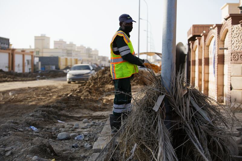 Clean-up operations in Al Khaburah.