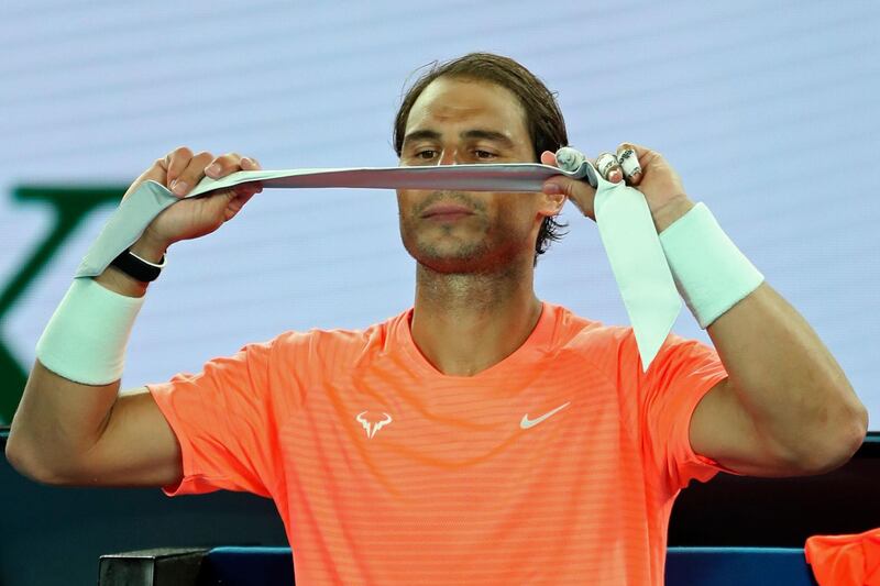 Spain's Rafael Nadal adjusts his headband in Melbourne. AFP
