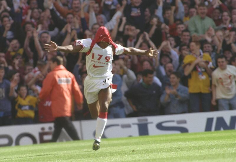 13 Sep 1997:  Ian Wright of Arsenal celebrates breaking the Arsenal goal scoring record set by Cliff Bastin at Highbury in London, England. \ Mandatory Credit: Allsport UK /Allsport