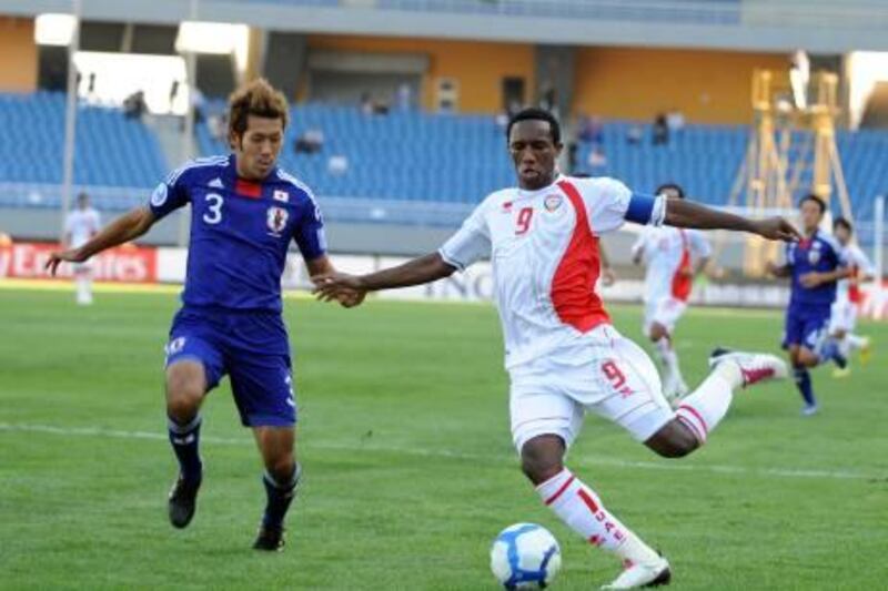 October 4, 2010, Xibo, China: The UAe's Ahmed Khalil takes on a Japanese defender in the Asian Under 19 Championship. Photo courtsey of Ali Saif Ali ALSAADI / Al Ain Sports & Cultural Club
