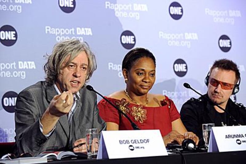 Bob Geldof, left, Arunma Oteh, the treasurer of the African Development Bank, and Bono share a common interest for Africa. Bertrand Guay / AFP