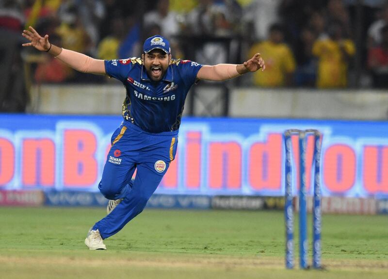 Mumbai Indians cricket captain Rohit Sharma celebrates after winning the 2019 Indian Premier League (IPL) Twenty20 final cricket match between Mumbai Indians and Chennai Super Kings at the Rajiv Gandhi International Cricket Stadium in Hyderabad on May 12, 2019. (Photo by NOAH SEELAM / AFP) / ----IMAGE RESTRICTED TO EDITORIAL USE - STRICTLY NO COMMERCIAL USE-----