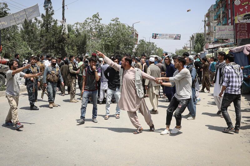 People react at the scene of an attack at an MSF (Doctors without Borders) clinic in Kabul, Afghanistan.  EPA