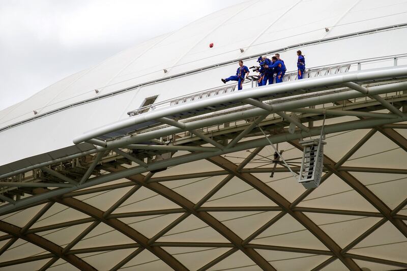 Mark Bickley of the Crows kicks a football off the roof of the Riverbank Stand at Adelaide Oval in Adelaide, Australia. Getty Images