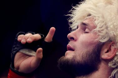 FILE PHOTO: MMA - UFC 242 - Khabib Nurmagomedov v Dustin Poirier - Men's UFC Lightweight title - Yas Island, Abu Dhabi, United Arab Emirates - September 7, 2019 Khabib Nurmagomedov reacts after winning his match against Dustin Poirier REUTERS/Christopher Pike/File Photo