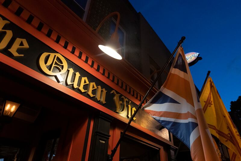 Washington's The Queen Vic, where people gathered before dawn to watch the funeral. EPA