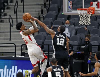 SAN ANTONIO, TX - JANUARY 14: Christian Wood #35 of the Houston Rockets shoots over LaMarcus Aldridge #12 of the San Antonio Spursat AT&T Center on January 14, 2021 in San Antonio, Texas. NOTE TO USER: User expressly acknowledges and agrees that , by downloading and or using this photograph, User is consenting to the terms and conditions of the Getty Images License Agreement.   Ronald Cortes/Getty Images/AFP
== FOR NEWSPAPERS, INTERNET, TELCOS & TELEVISION USE ONLY ==
