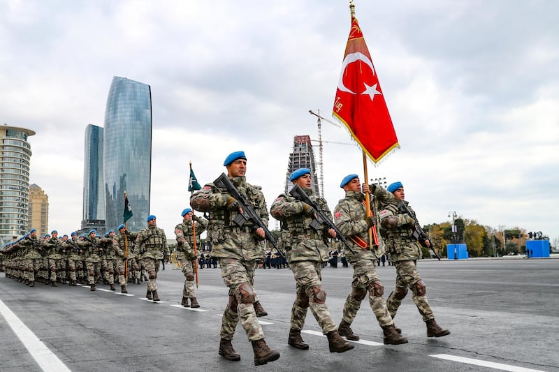 Members of a Turkish forces commando brigade take part in the military parade in Baku, Azerbaijan, on December 10, 2020. AP Photo