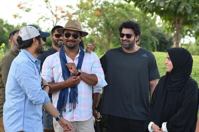 Sujeeth Reddy with Prabhas, the film's producer and H.E. Maryam Eid Al Mheiri in Abu Dhabi