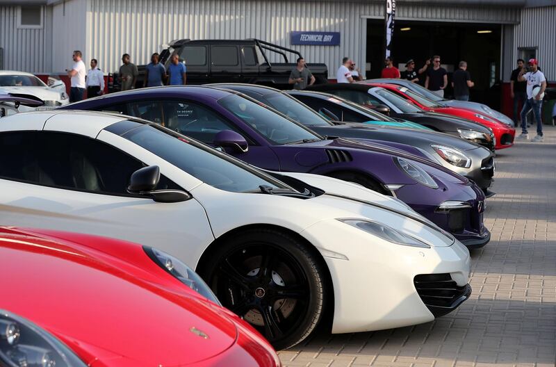 DUBAI, UNITED ARAB EMIRATES, August 31 – 2018 :- Members and Guests of the Ninth Degree supercars club parked their cars during the Ninth Degree supercars club meet held at Dubai Autodrome in Dubai. ( Pawan Singh / The National )  For Motoring. Story by Adam Workman