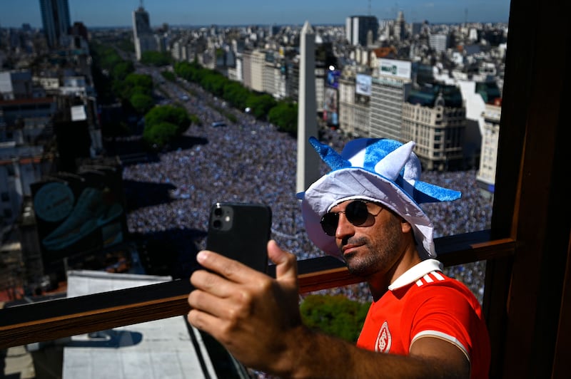 An Argentina fan takes a selfie in Buenos Aires. AFP