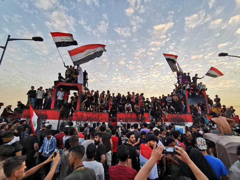 Iraqi demonstrators gather to mark the first anniversary of the anti-government protests in Baghdad, Iraq.  Reuters