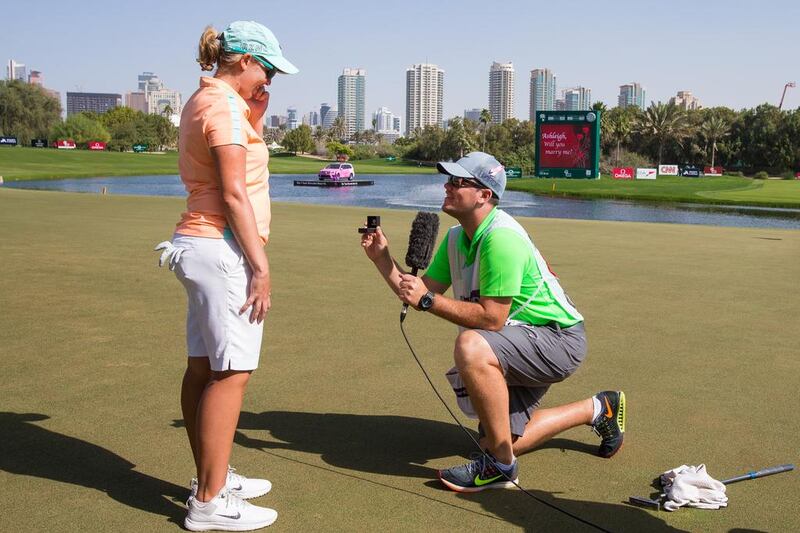 Caddie David Buhai proposes to girlfriend, European Tour golfer Ashleigh Simon at the Dubai Ladies Masters tournament on Saturday. Tristan Jones / European Tour