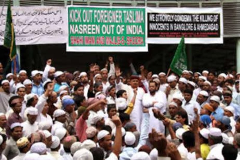 Muslims in Kolkata demonstrate, demanding the deportation of the Bangladeshi author Taslima Nasreen.