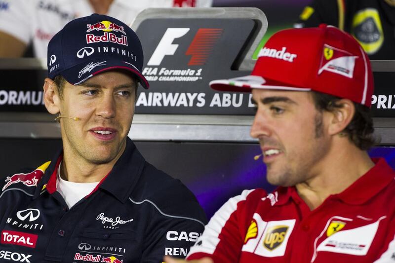 Fernando Alonso, right, was found by a report to be Formula One's most marketable driver while Sebastian Vettel, left, winner of the last four championships, was deemed the sport's fourth most marketable figure. Christopher Pike / The National