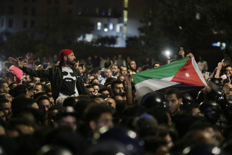 Flags are waved during the Amman demonstrations. Andre Pain / EPA