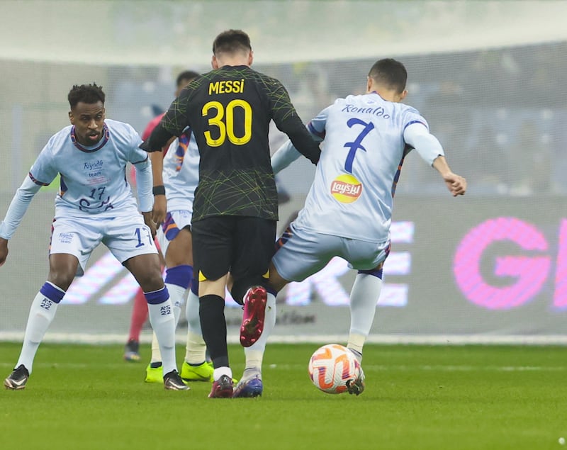 Messi and Ronaldo vie for the ball during the Riyadh All-Stars against PSG at the King Fahd University Stadium in Riyadh, Saudi Arabia. Photo: General Entertainment Authority