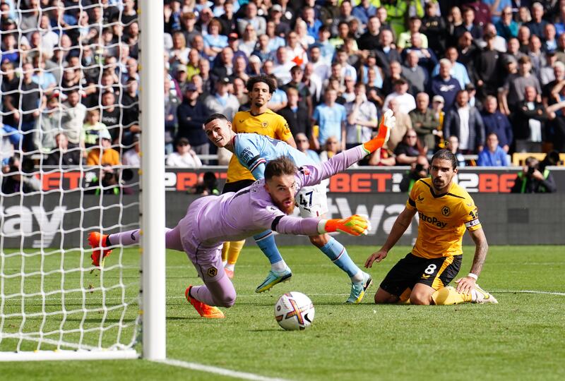 City's Phil Foden scores the third goal. PA