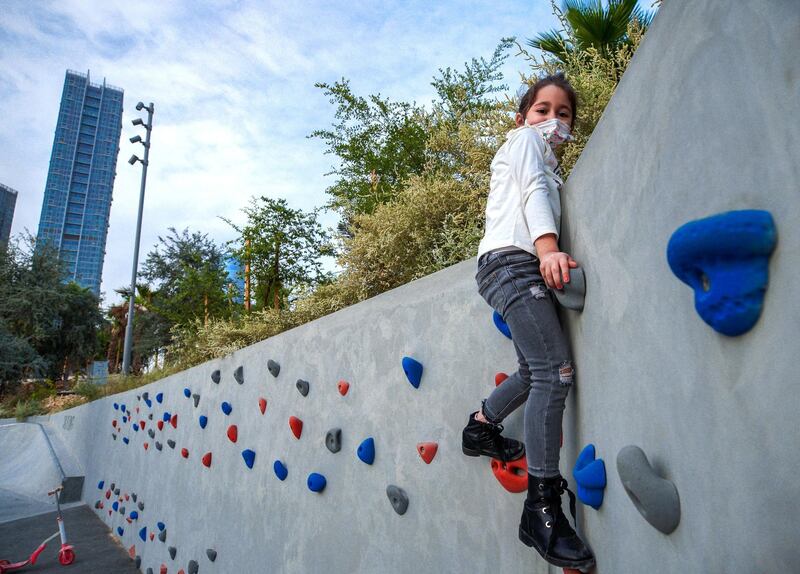 Abu Dhabi, United Arab Emirates, January 21, 2021.  Maria Agha, 6, practices wall climbing at Al Fay Park on Reem Island.
Victor Besa/The National 
Section:  LF
Reporter: Panna Munyal