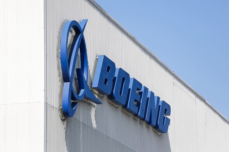 Boeing reported its first quarterly profit since 2019 on a recovering commercial aviation market that will enable the company to cut fewer jobs than planned.