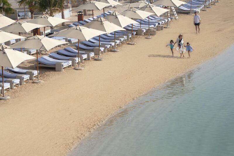 The private beach backs on to an infinity pool, adults-only pool and children's swimming pool.