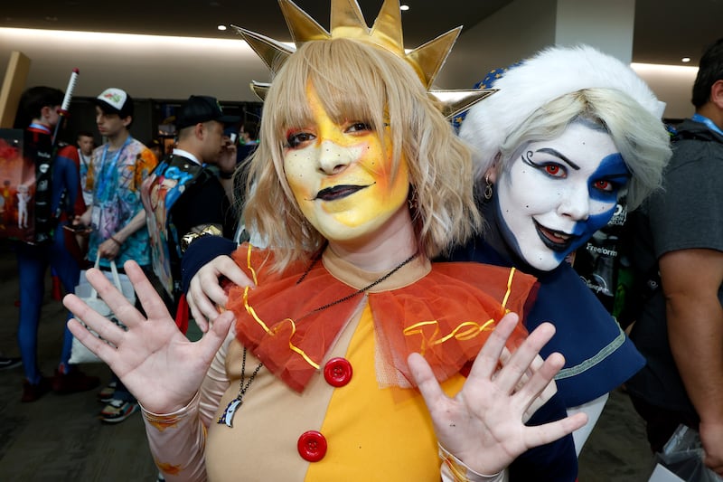 From left, San Diego residents Cassandra Zimmerman, dressed as Sundrop, and Ten Frandsen, dressed as Moondrop, from Five Nights at Freddy's. AP