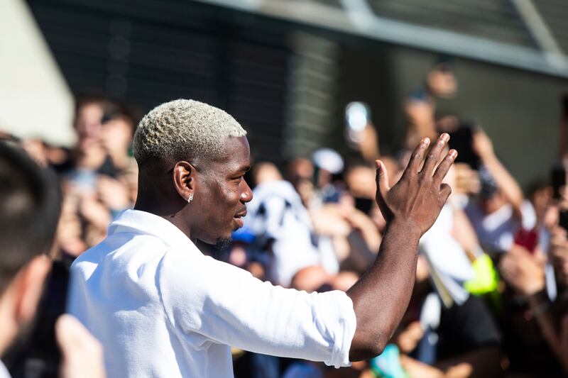 More than 1,000 fans welcomed Paul Pogba back home as he returned to Juventus on a free transfer from Manchester United. AP