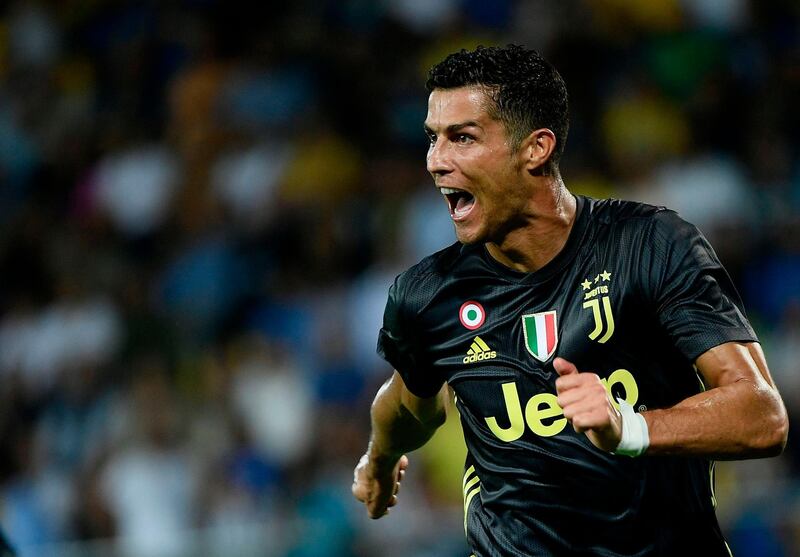 Juventus' Portuguese forward Cristiano Ronaldo celebrates after he scored during the Italian Serie A football match between Frosinone and Juventus Turin on September 23, 2018 at the Benito-Stirpe Stadium in Frosinone.  / AFP / Filippo MONTEFORTE
