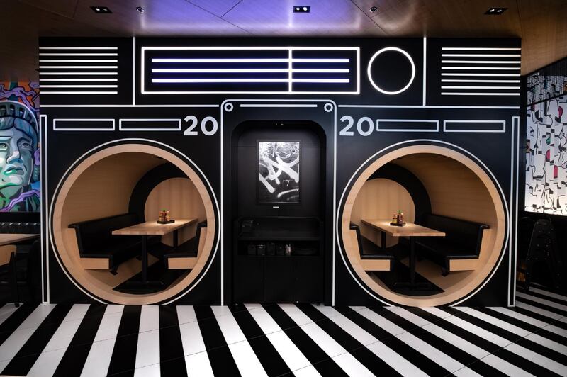 The new venue's signature interiors include a ‘boombox booth’ and ‘cassette wall’, keeping its old-school, hip hop roots in mind. All photos courtesy Black Tap Dubai