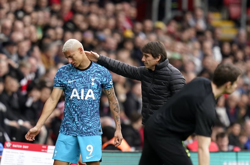 Tottenham's Richarlison leaves the pitch after picking up an injury. PA