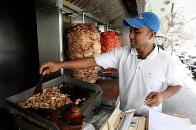 DUBAI, UNITED ARAB EMIRATES Ð July 2:  One of the Shawarma ( arabic style sandwich ) shop at Nasser square in Deira Dubai . (Pawan Singh / The National)

 *** Local Caption ***  PS01- FOOD.jpg