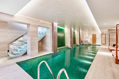 The mosaic-lined swimming pool has underwater and ceiling speakers. Wetherell / Darran Mulcahy Photography