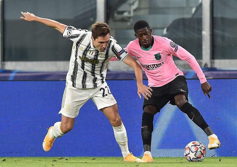 Juventus' Federico Chiesa and Barcelona's Ousmane Dembele in action. EPA