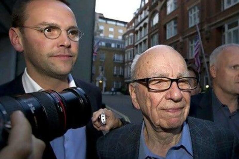 Rupert Murdoch, right, and his son James. AP Photo