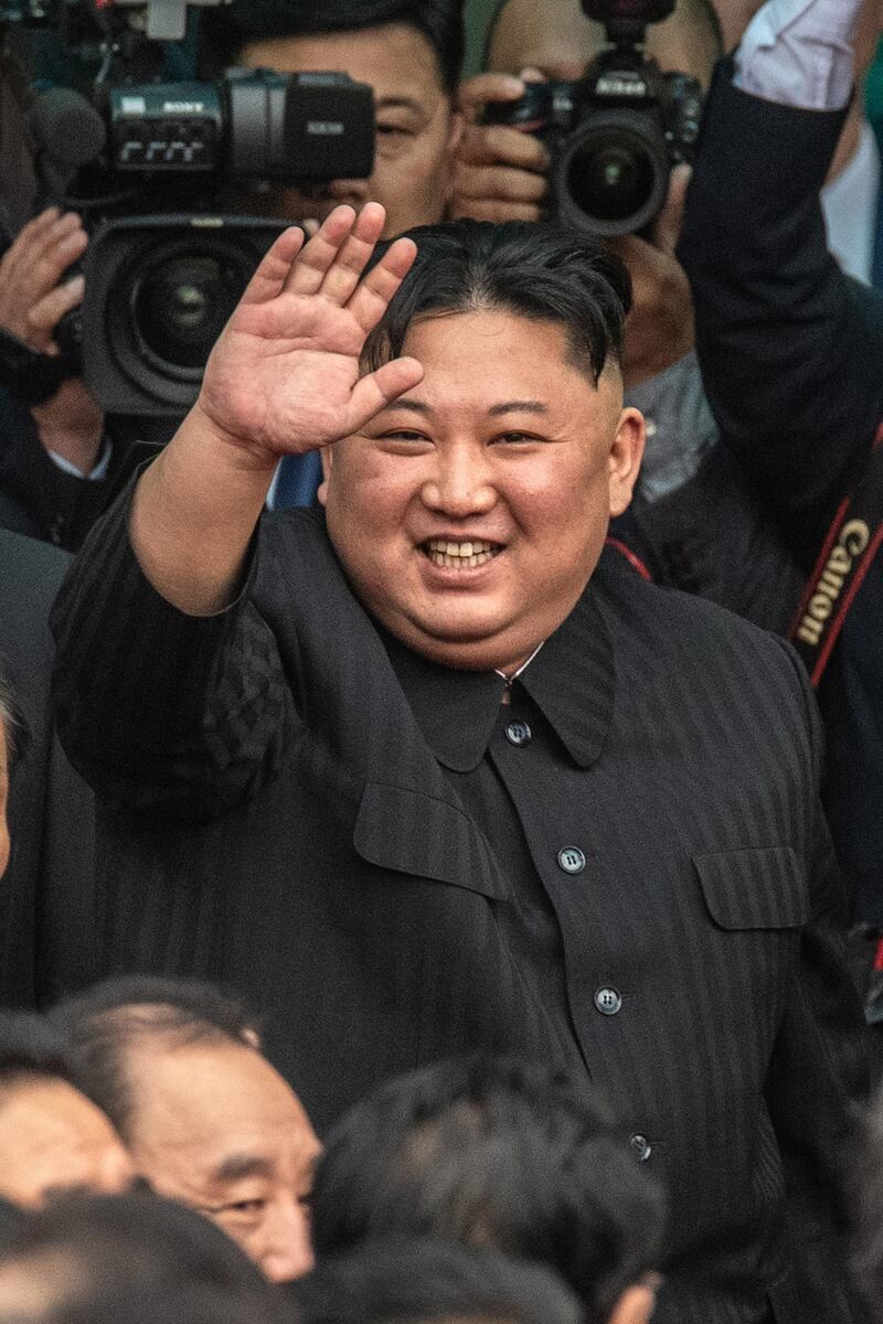 North Korean leader Kim Jong-un waves as he prepares to leave Vietnam by train after a two day official visit preceded by the DPRK-USA Hanoi summit, on March 2, 2019 in Dong Dang, Vietnam. Getty Images
